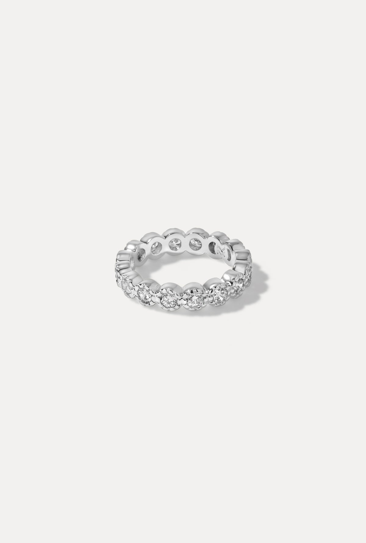 Silver Isabelle ring featuring a delicate band and polished finish, centered on a plain white background.