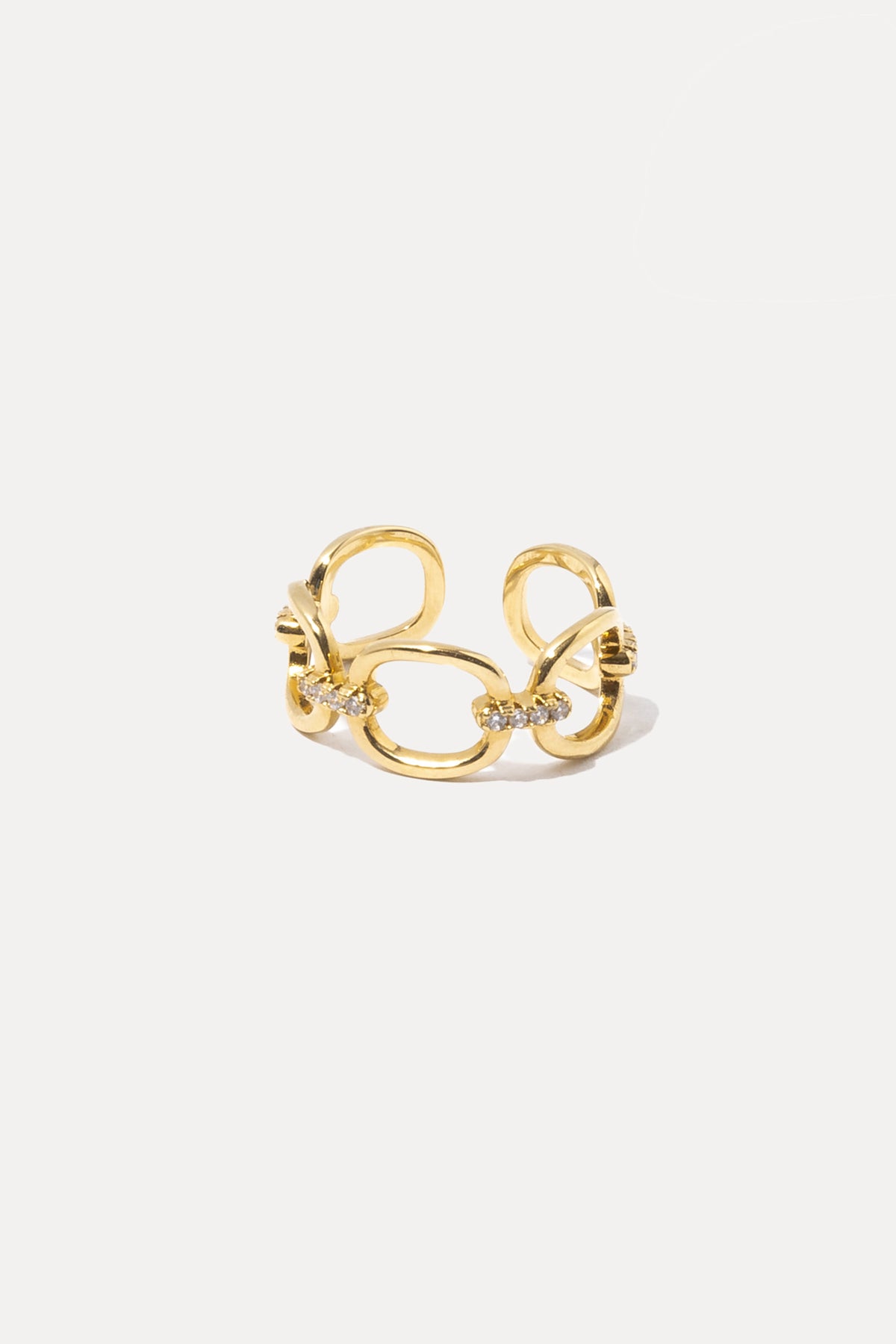 Gold Kennedy ring featuring a delicate band and polished finish, centered on a plain white background.