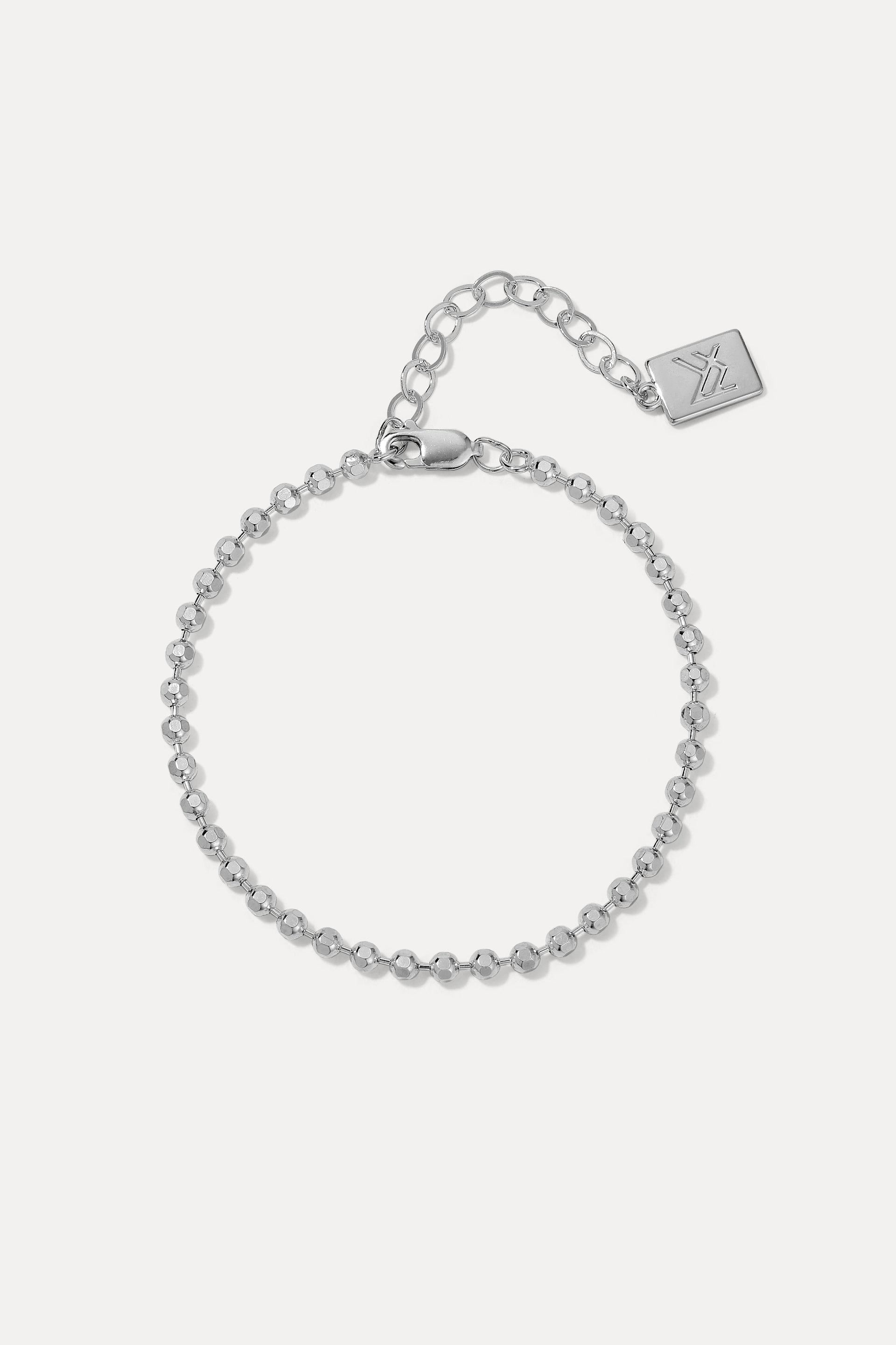 Sterling silver London ball chain bracelet with diamond-cut beads displayed in a circle on a white background.