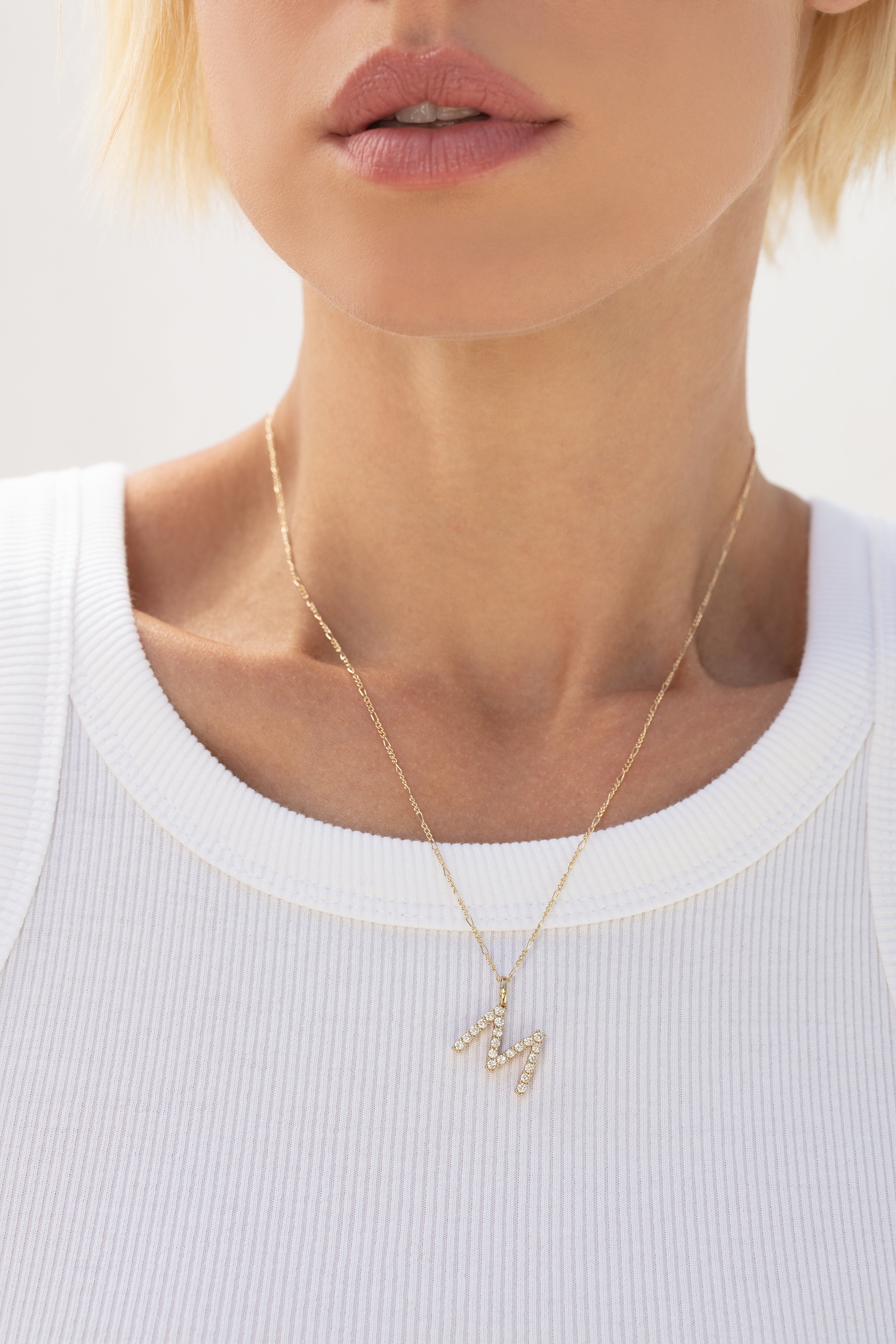 Pave Initial Charm