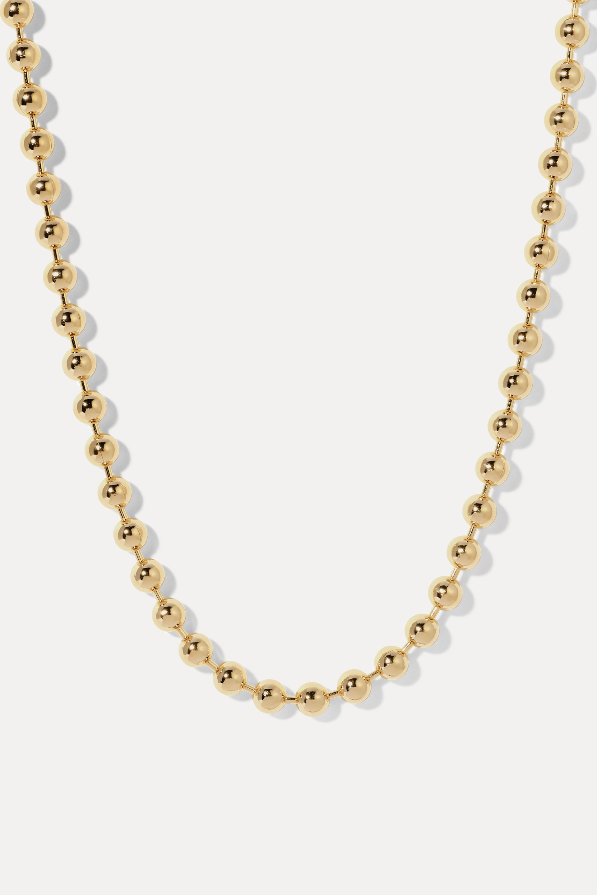 Gold Manhattan ball chain necklace with polished 4mm beads, displayed on a clean white background.