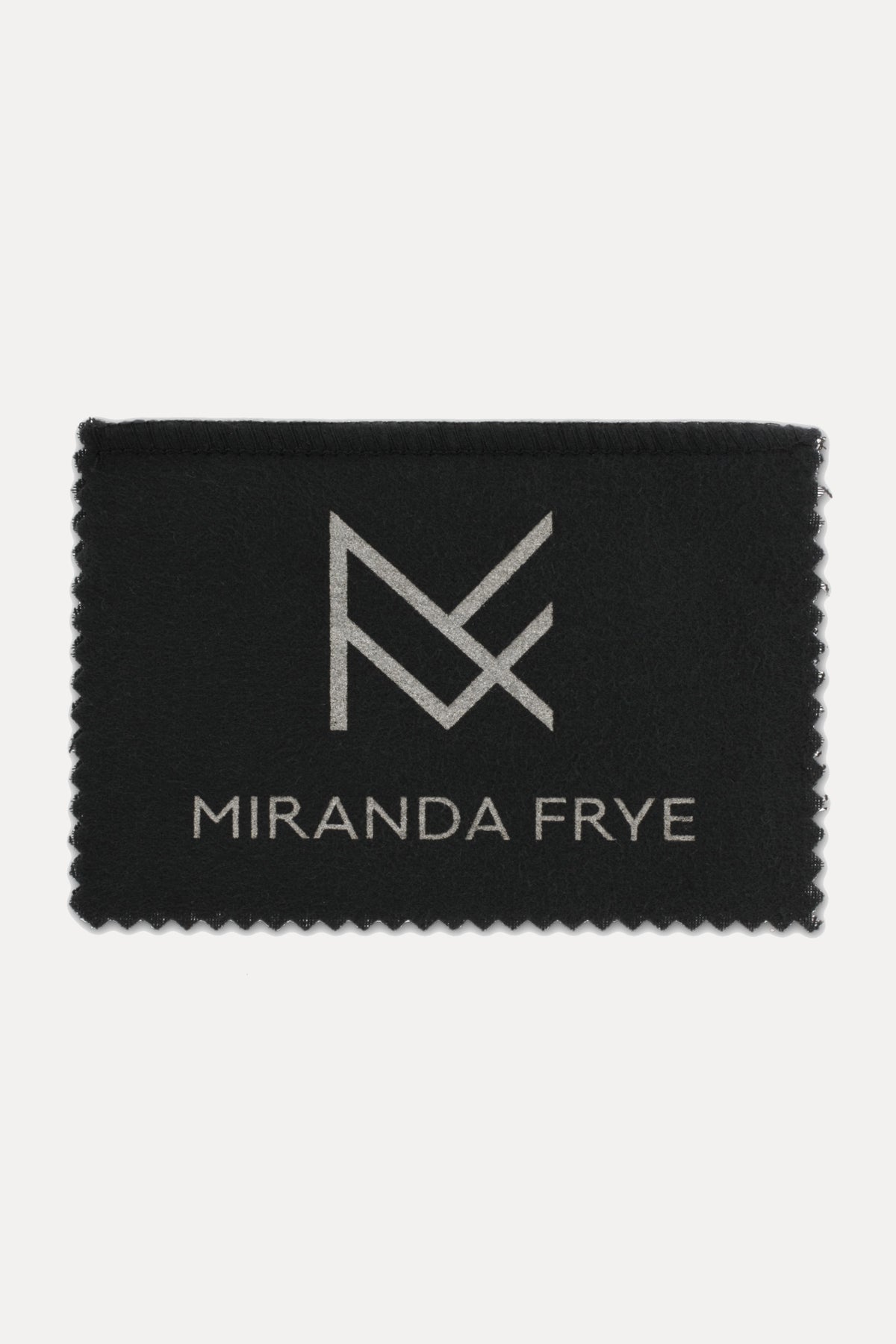 Image of the Miranda Frye silver polishing cloth with logo against a white background.