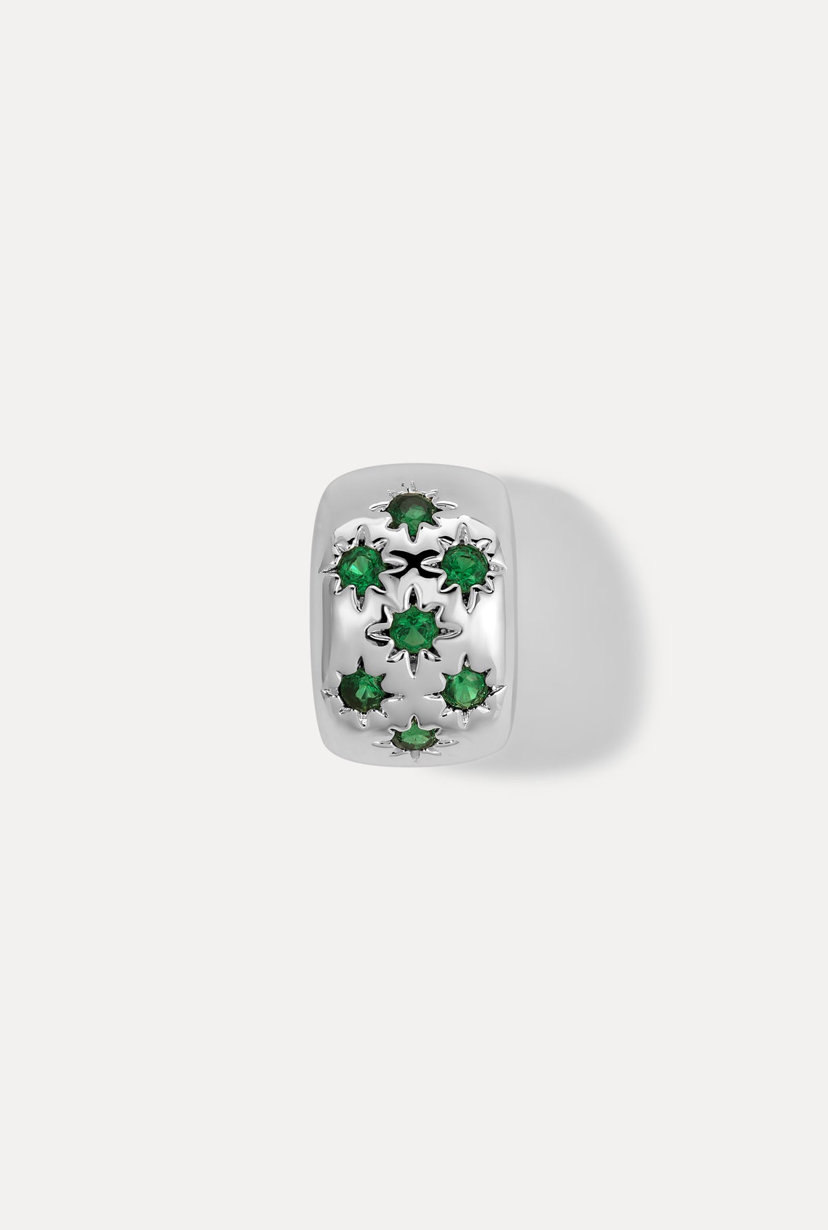 Silver Celeste slider charm with sparkling emerald stones on white background