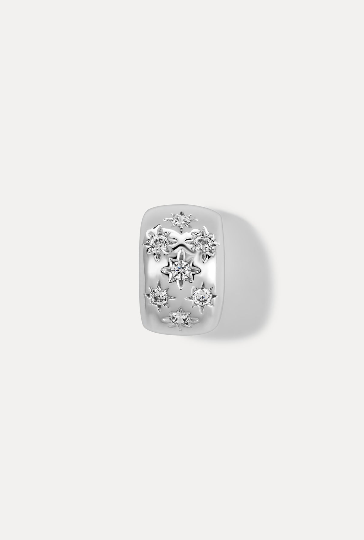 Silver Celeste slider charm with sparkling clear stones on white background