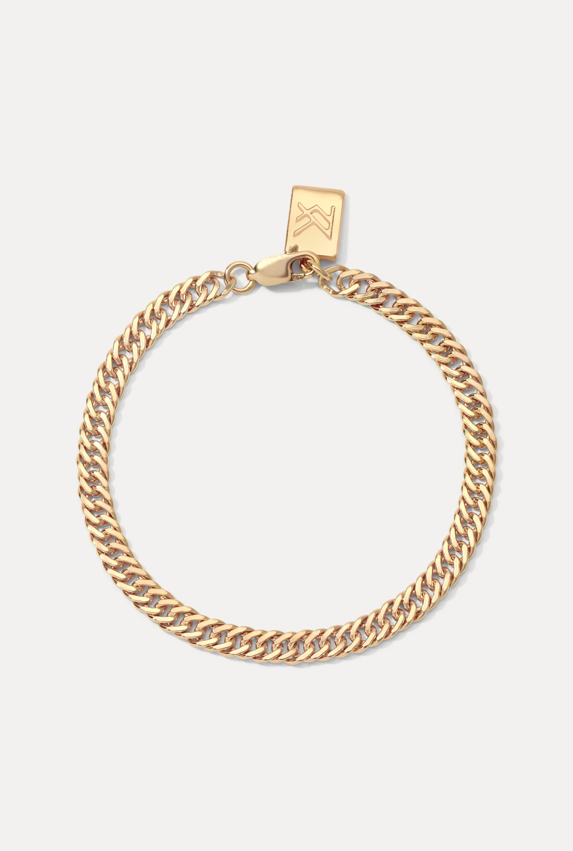 Gold-filled Blair Bracelet displayed in a circle on a white background with logo tag.