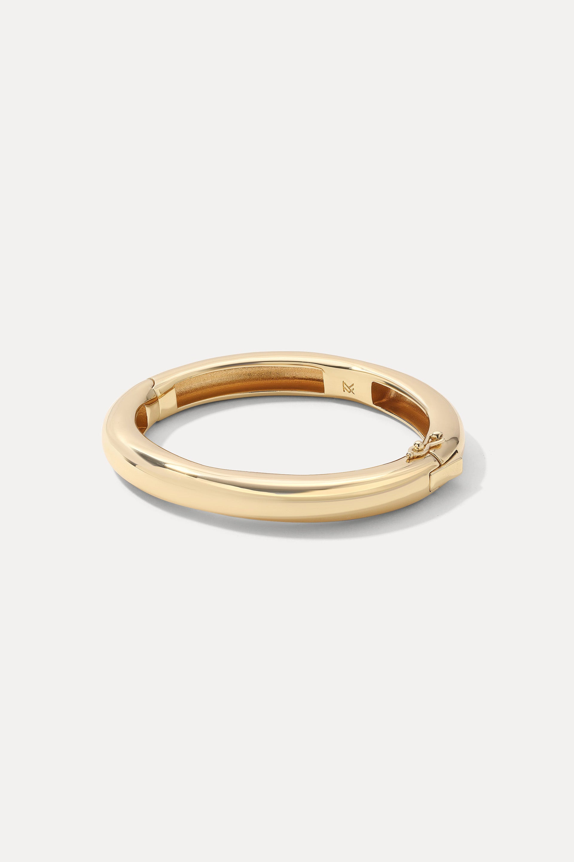 18k gold-plated Cleo Cuff displayed in an oval shape on a clean white background.