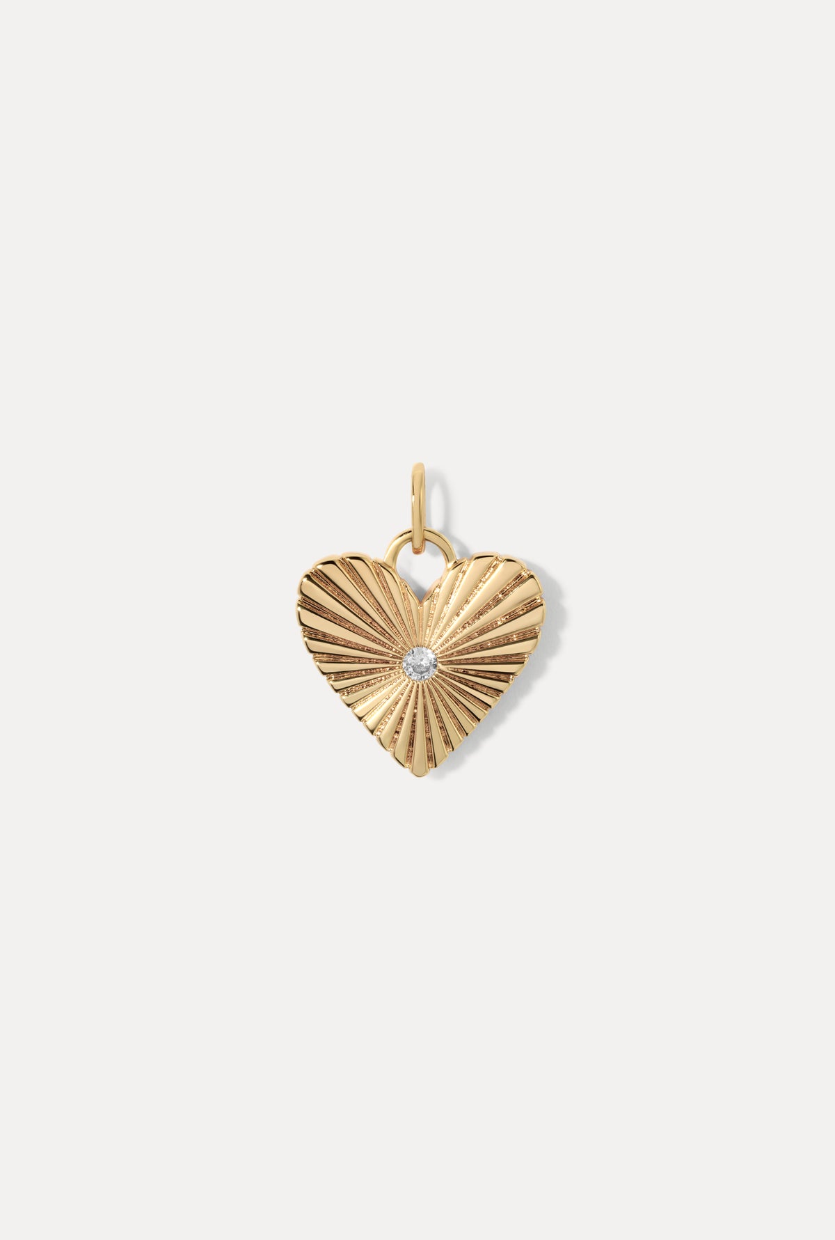 Gold Eleanor Charm featuring a radiant heart shape with textured grooves and a CZ stone on a white background.