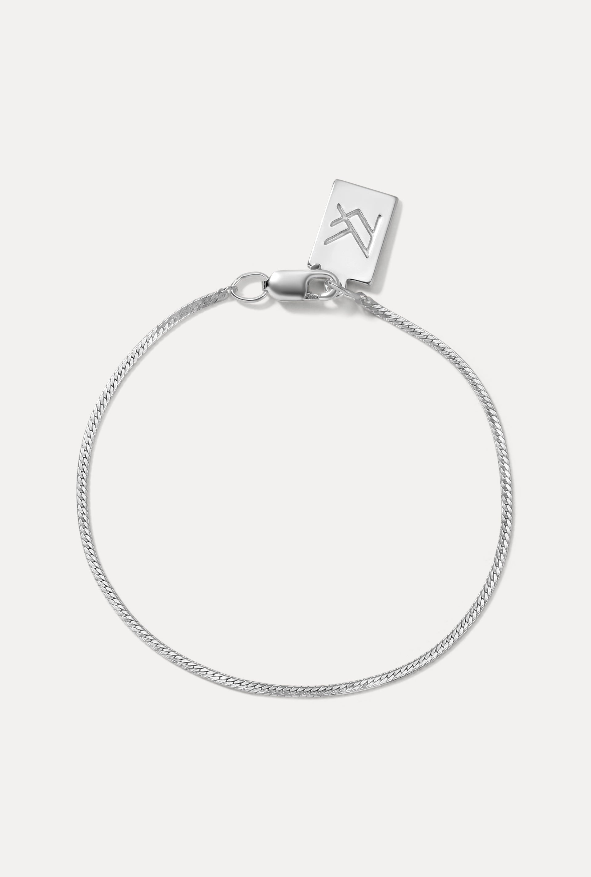 Sterling silver Josephine Bracelet displayed in a circle on a white background with clasp and logo tag.