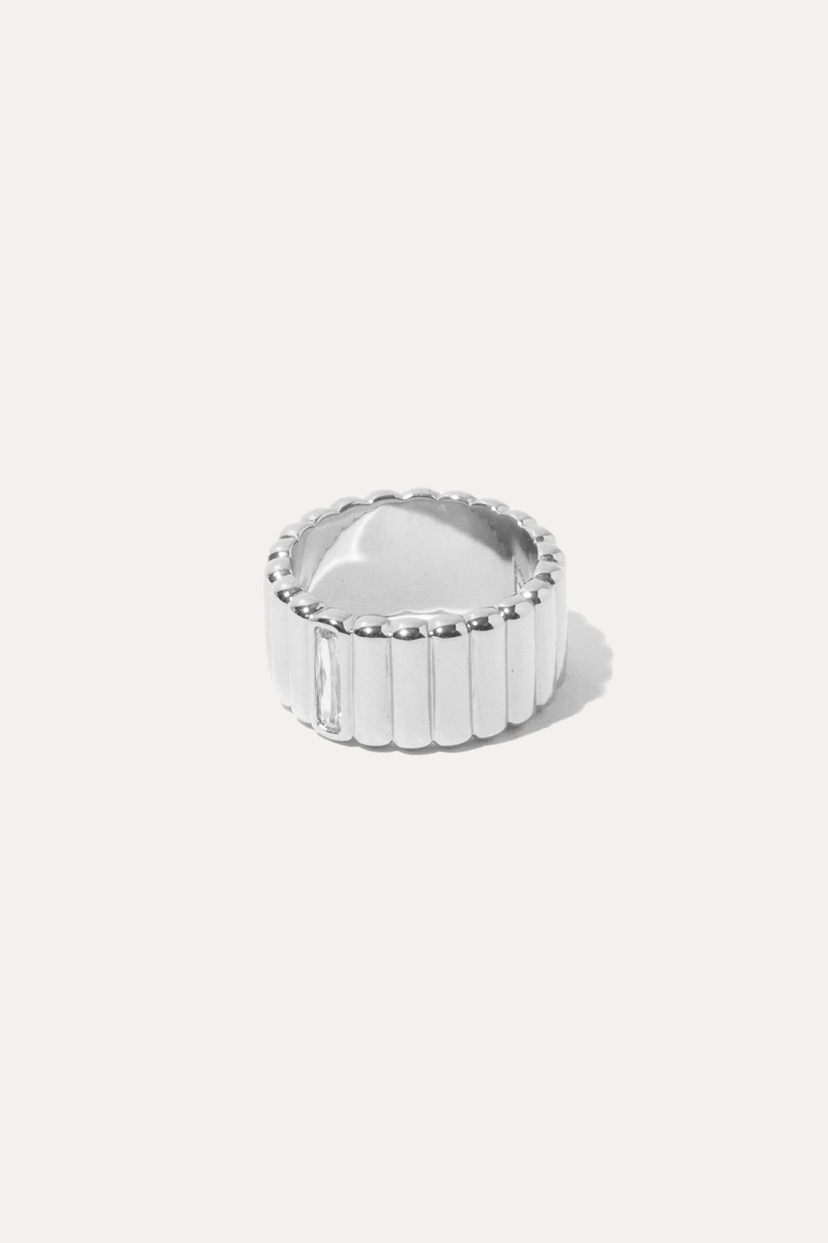 Silver Lisa ring featuring a delicate band and polished finish, centered on a plain white background.
