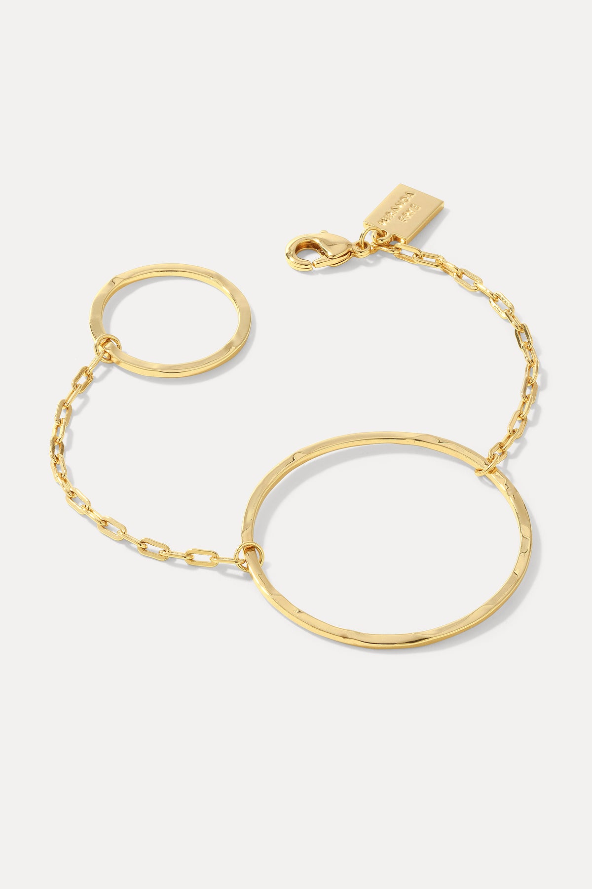 Gold Quinn circle link bracelet with clasp and logo tag displayed on a plain white background.