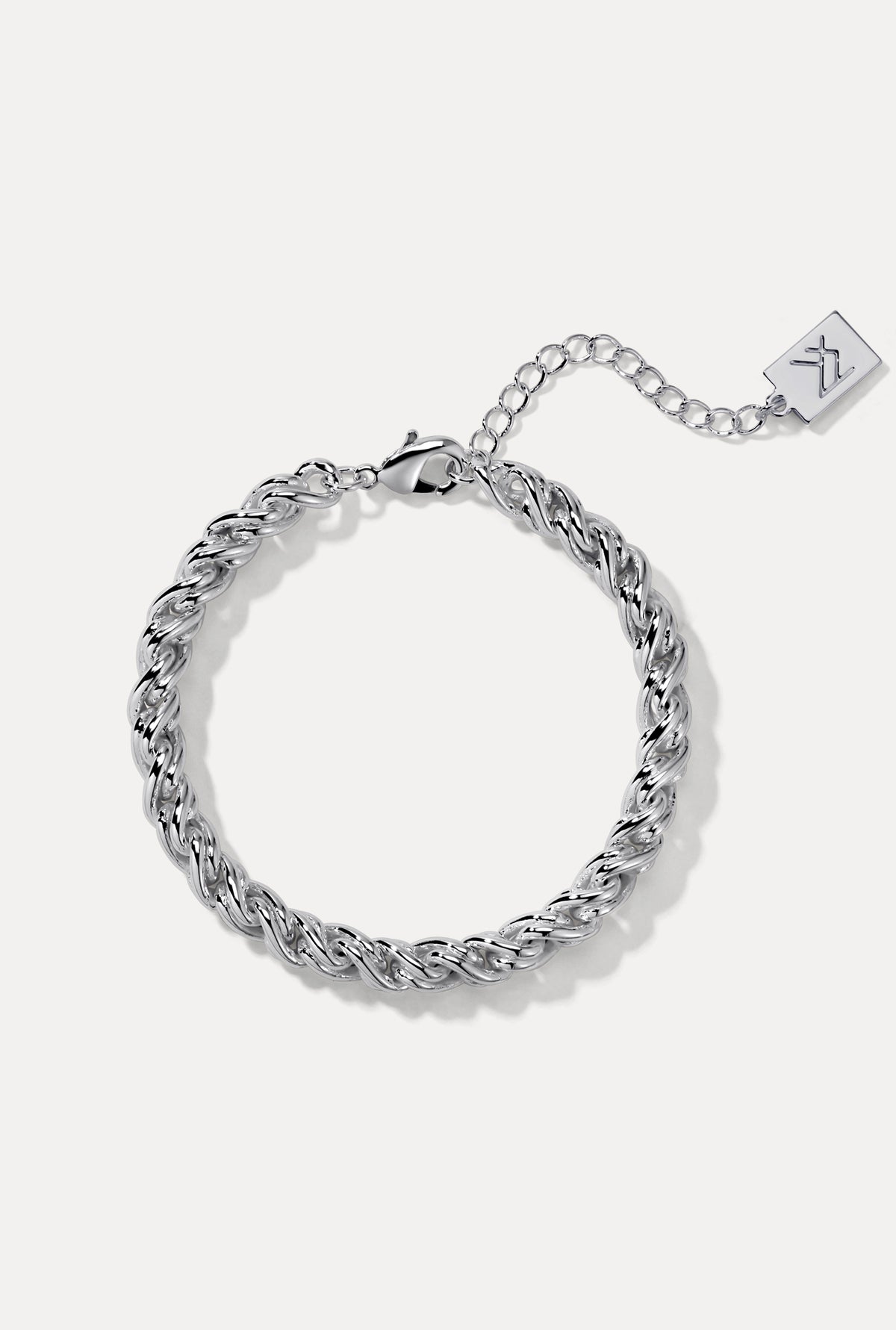 Sterling silver Adriana Bracelet on white background showing 6mm rope chain, clasp, and logo tag.