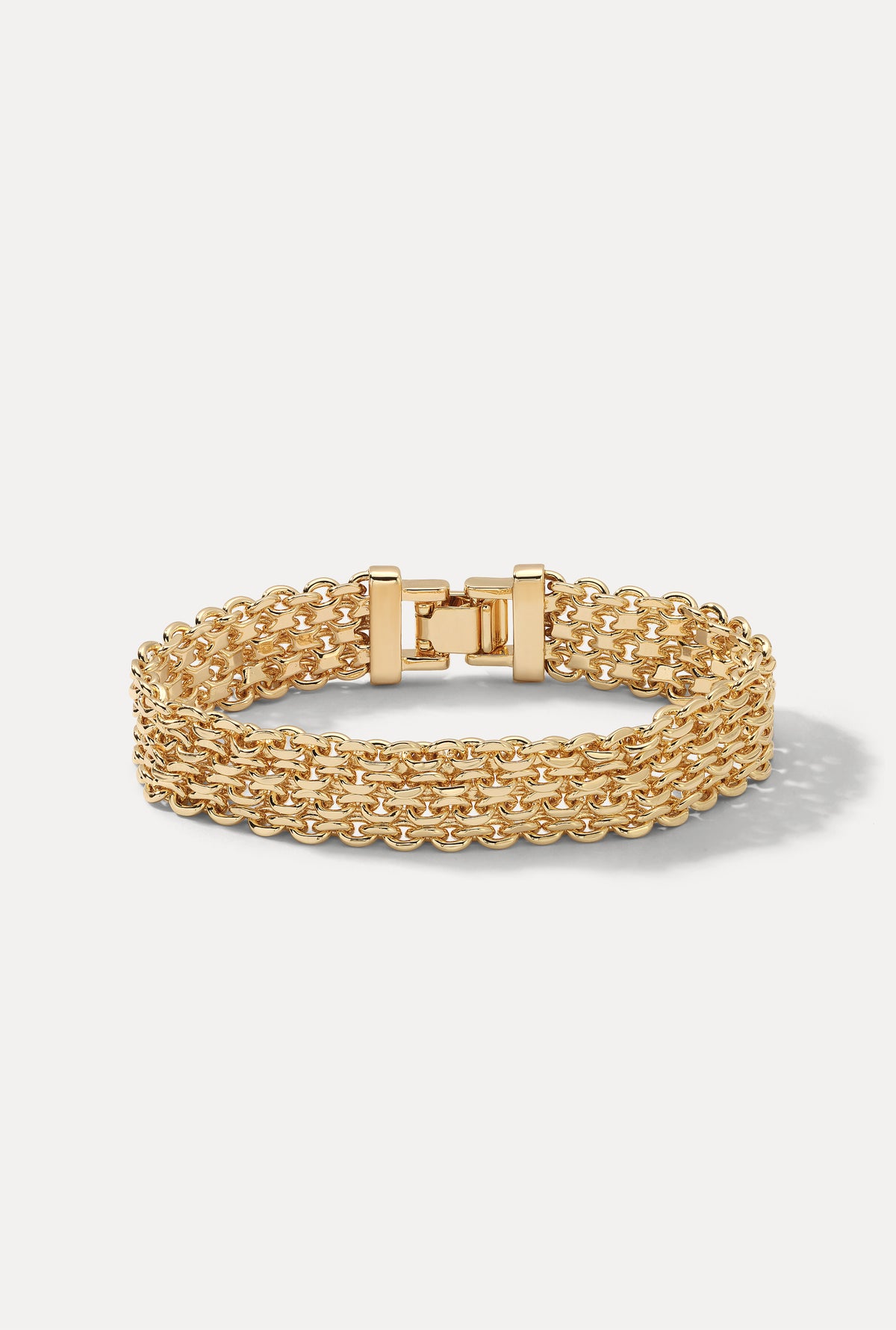 Gold Camryn multi-strand woven chain bracelet with fold-over clasp on white background