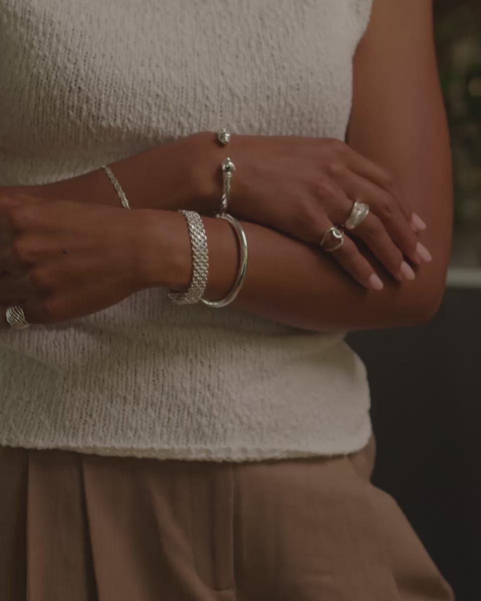 short video showing the Camryn Bracelet, Mina cuff and Panther cuff stacked together on the wrist.